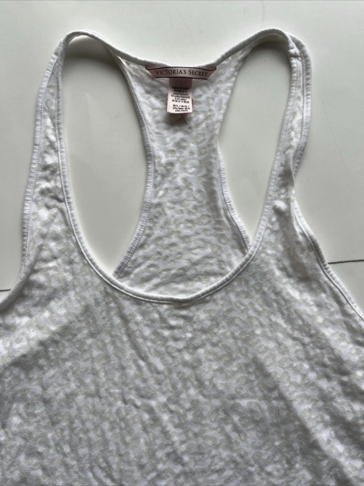 TANQUE SIN MANGAS VICTORIA’S SECRET GUEPARDO BLANCO TALLA: M/L Foto 4 de 4