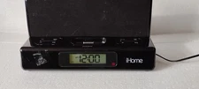 IHome Model iP27 Portable System for Iphone iPod Speakers Alarm Clock turns on