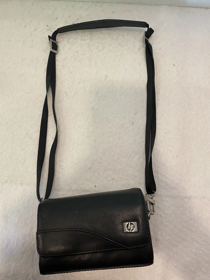 Estuche de transporte para cámara HP negro con correa y clip para cinturón, usado en excelente estado Foto 3 de 4