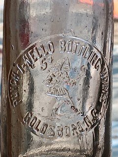 PUNCH I NELLO BOTTLING WORKS GOLDSBORO NC 5 cent Elf Amethyst Soda Bottle