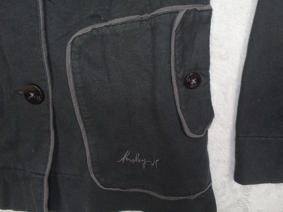 Chaqueta con Capucha Hurley Mujer Polar Negra con Tubería Gris Abrigo Abotonado Estilo Pequeño Foto 3 de 4