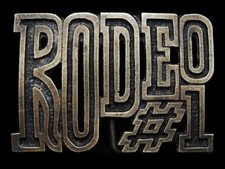 KD23140 REALLY NICE VINTAGE 1970s CUT-OUT RODEO 1 BRASSTONE BELT BUCKLE