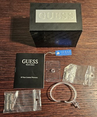 Guess Watch Box with instruction booklet and other items - no watch