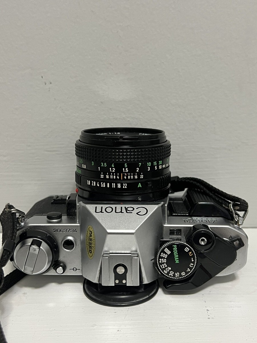 1980s CANON AE-1 Program 35mm Film Camera with Canon FD 50mm f1.8