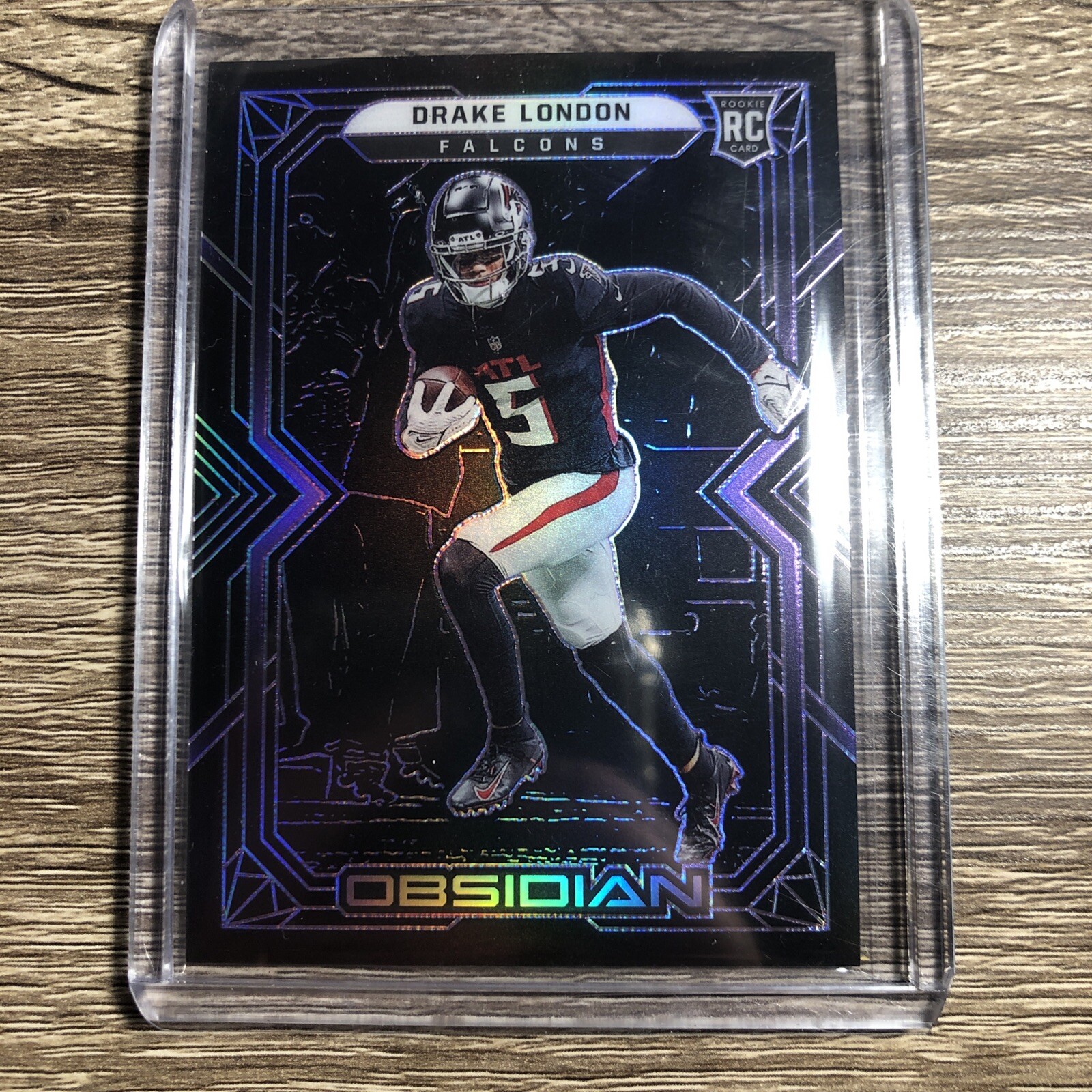 2022 Panini Obsidian - Rookies Electric Etch Purple #112 Drake London /100 (RC)