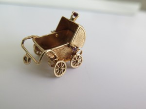 gold baby carriage