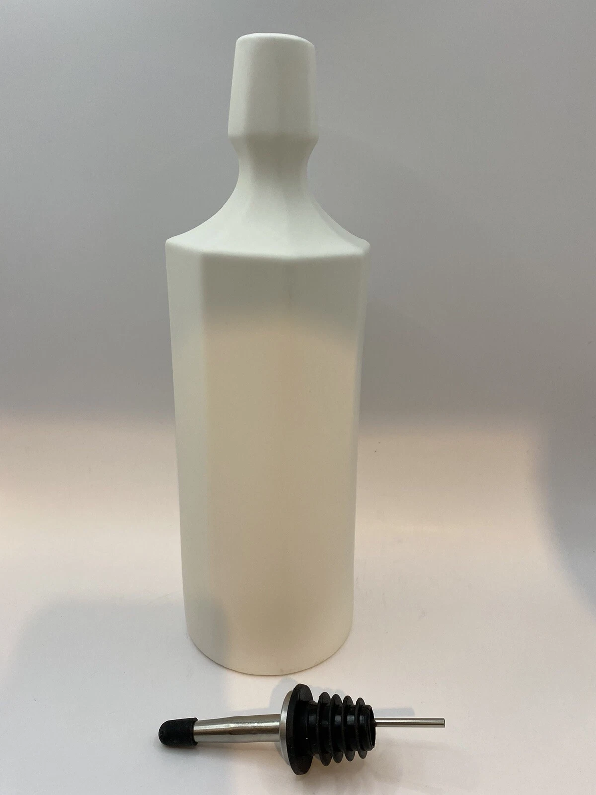 Elixer Bottle designed to store olive oil, vinegar