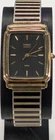 Vintage Timex Quartz Black Dial Gold & Black stretch band Tank Watch WORKS NICE