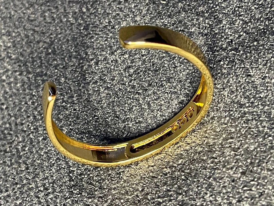 Brazalete minimalista diamantes flotantes oro Messika raro 18 cm Foto 2 de 4