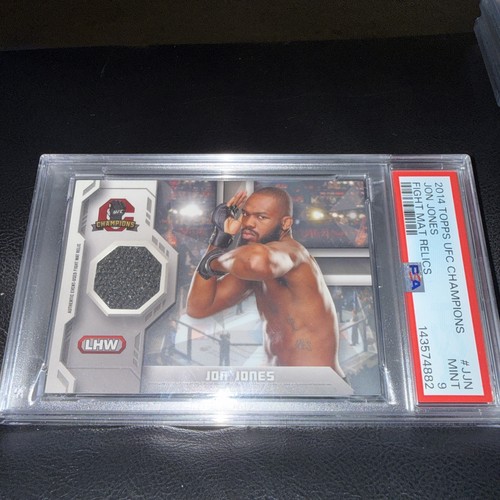 2014 Topps UFC Champions - Fighter Mat Relics Jon Jones #FMR-JJN (MEM)