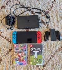 Nintendo Switch OLED 64GB Neon Blue/Red Plus FIFA 25, Mario Kart Deluxe 8, Zelda