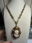 Vintage costume jewelry large cameo gold plated decorated with seed pearls
