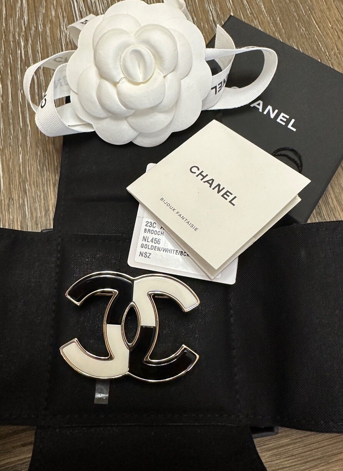 black chanel pin brooch