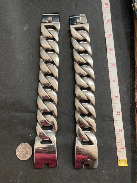 WOW! Impressive huge chrome pair of Curb Bracelets from Film Collection