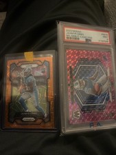 2023 Panini Jahmyr Gibbs Camo Pink Mosaic Rookie Debut (PSA 9) and Orange Prizm