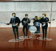 The Beatles figures cristal clear acrylic color 1964. They look incredibly real!