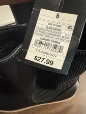 NWT girls size 5, Chelsea boots in black with an inside zipper, outside elastic.