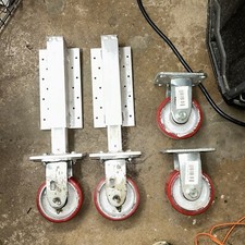 Two Spring Loaded Gate Wheels W/Two Spare Caster Wheels