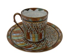 Vintage Japanese "Thousand Faces" Demitasse Cup and Saucer