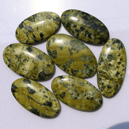 Venta al por mayor Lote de 7 piedras preciosas cabujón ovalado serpentina natural sin tratar 36-44 mm - Imagen 8 de 11
