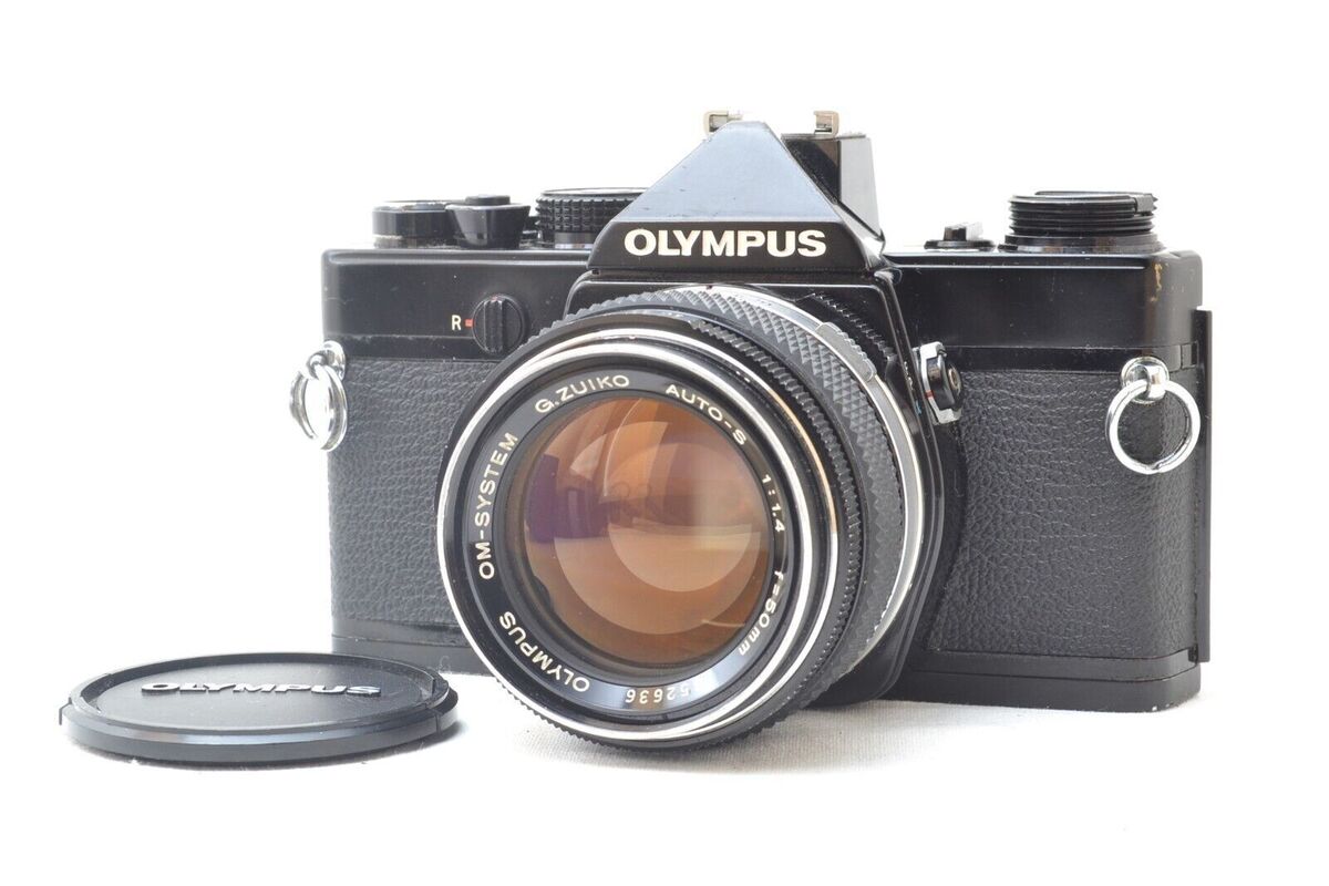 Olympus OM-1 OM-1n M-1 in Chrome or Black w/ optional 50mm f Olympus OM-1 OM-1n M-1 in Chrome or Black w/ optional 50mm f