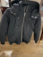 moose knuckles kids bomber jacket can also fit a women's xs small - small