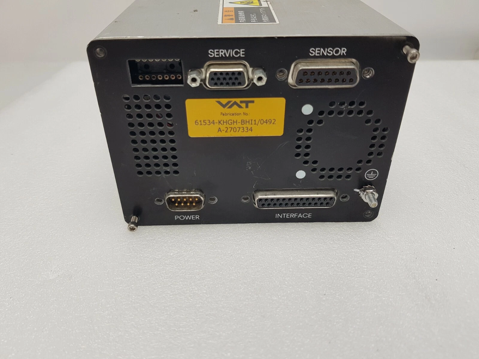VAT fabrication label 61534-KHGH-BHI1 above the SERVICE, SENSOR, POWER and INTERFACE connectors