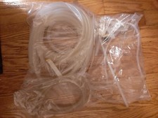 Silicone tubing 9 unused and two used pieces 10mm x 6mm x 2mm, length 1m each