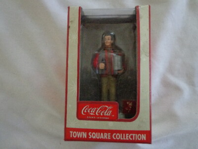  TOWN SQUARE  COLLECTION COCA COLA MAN HOLDING RECORDS & COKE W / WKOK COAT