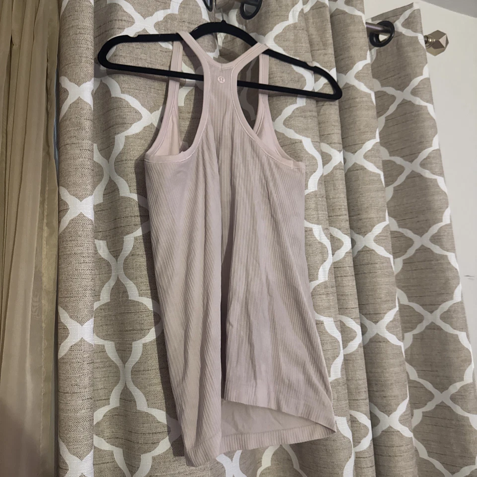Camiseta sin mangas para mujer Lululemon Ebb To Street talla 10 rosa claro Foto 2 de 3