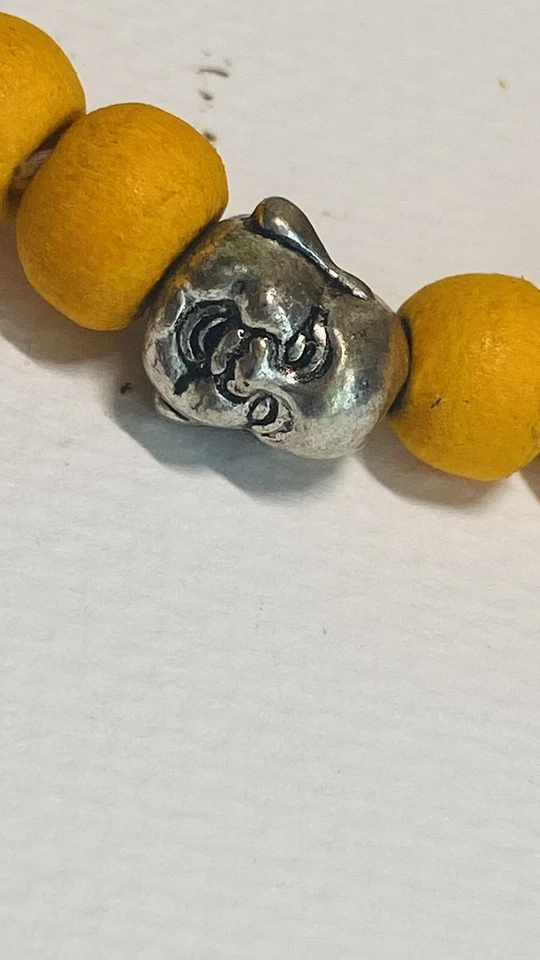 Pulsera artesanal de madera naranja con borla con dije de Buda" Foto 4 de 4