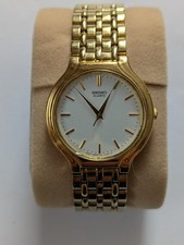 Seiko feine Quarz Armbanduhr Herrenuhr 6mm flach vergoldet