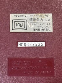 Nintendo Famicom (FC) console, model number H1555532, includes software, service