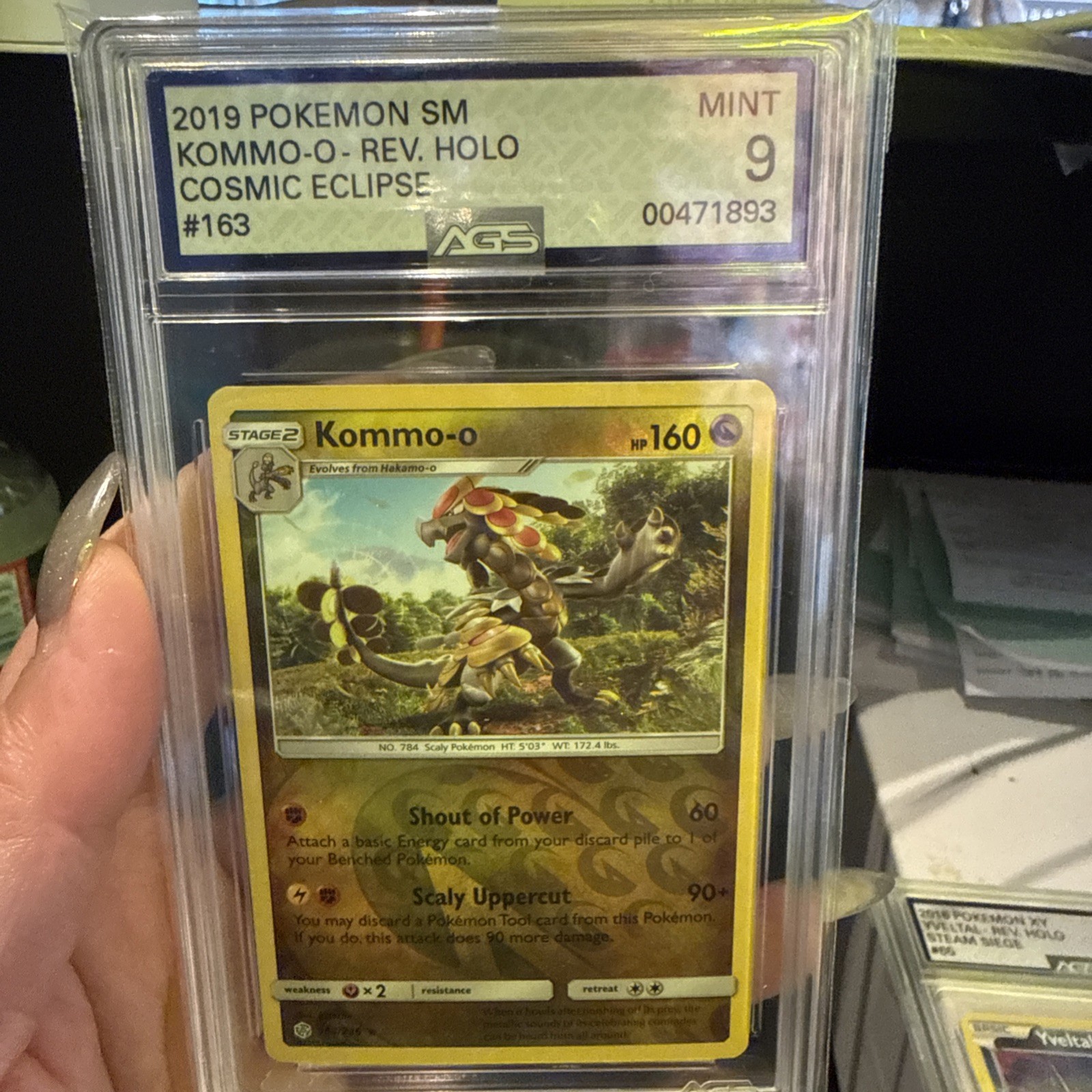 2019 Pokemon SM Kommo-o  Holo 163/236 Cosmic Eclipse Graded AGS 9 Mint