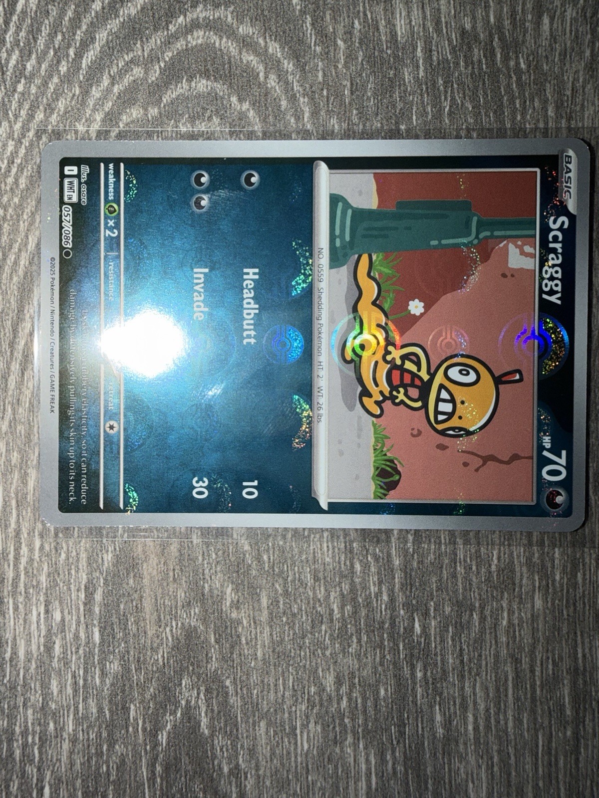 Pokemon TCG Scraggy 057/086 - Poke Ball Pattern SV: White Flare Common Card NM