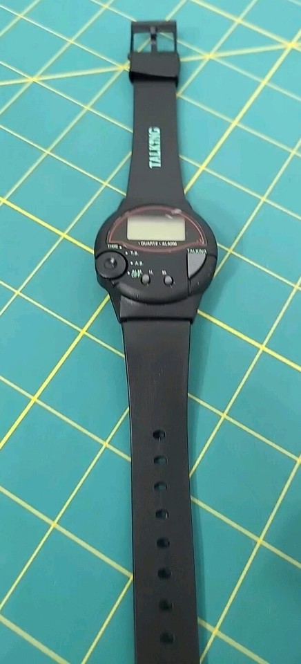 A vintage talking digital watch that announces the time out loud — peak Y2K absurdity and a genuine conversation piece.