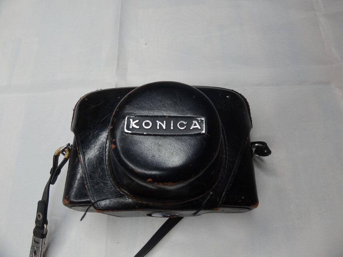 Konica Hexanon 1:1.8 f=45mm Auto S2 35mm Camera Made In Konica Hexanon 1:1.8 f=45mm Auto S2 35mm Camera Made In