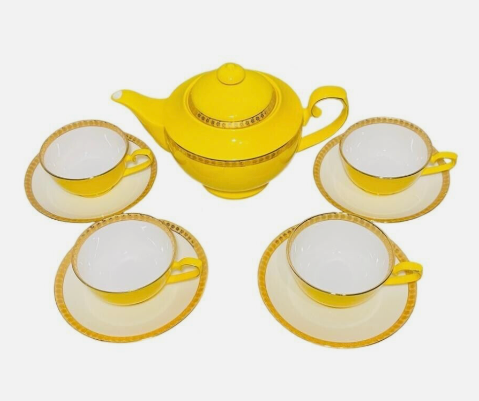 Teavana bone china tea set with real gold trim. (New but never used