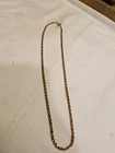 Gold necklace vintage listing as costume jewelry not for sure if it's real .