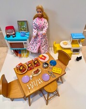 Vintage Barbie in kitchen with wood table, chairs, microwave, child's kitchen