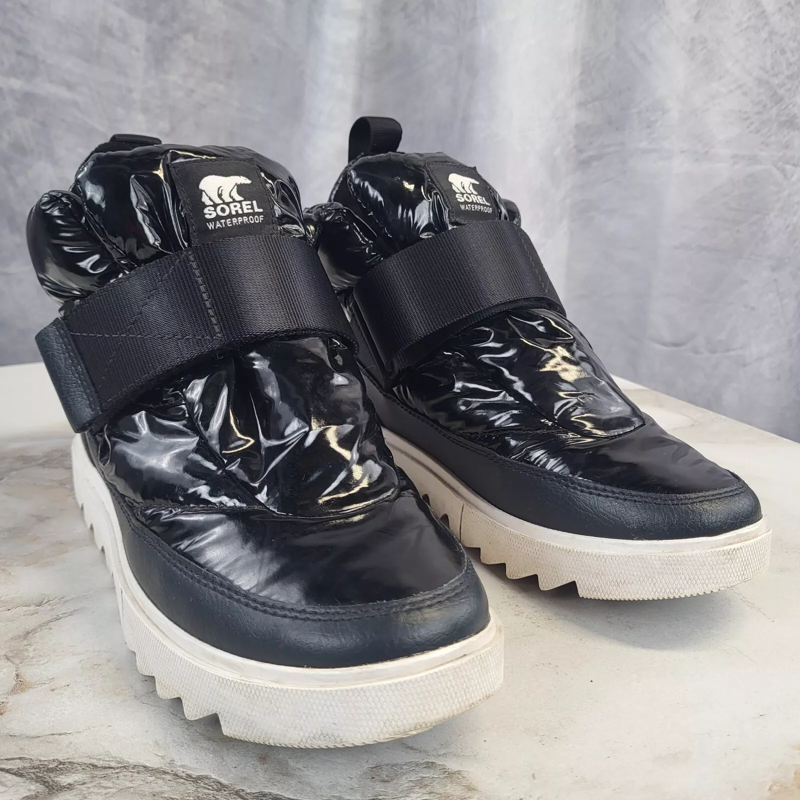 sorel joan of arctic next lite ankle strap puffy sneaker boots