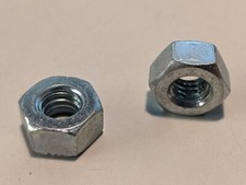 5/16-18 HEAVY HEX NUTS ZINC 100 EACH