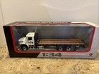 First Gear Komatsu Freightliner M2 with Jerr-Dan Rollback Car Carrier 10-4020A
