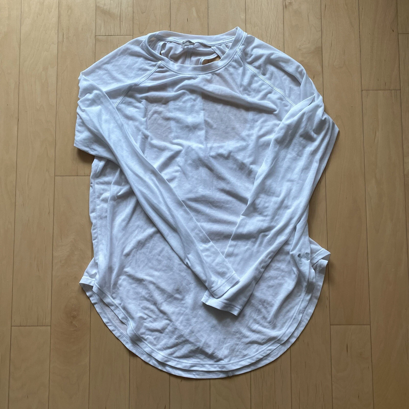 Haut manches longues UNDER ARMOUR Supreme blanc athlétisme yoga taille M