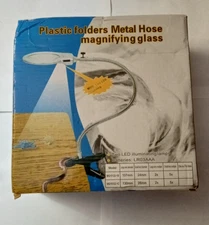 Plastic folders metal hose magnifying glass - 2 LED illuminating lamps, NIB