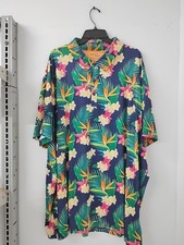 Birdie Bound Men's Novelty Print Golf Polo features a vibrant tropical birds of