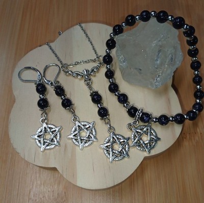 This stunning Jewelry Set features the sparkling Blue Goldstone and Pentagrams