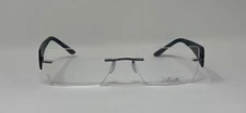 Silhouette 7598 40 6053 Rimless Eyeglasses, Gray Temples. Size 54-19-145