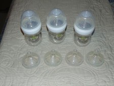 THREE NEW NUK SIMPLY NATURAL 5-OZ BABY BOTTLES 3 STAGE 1 AND 4 STAGE 2 NIPPLES