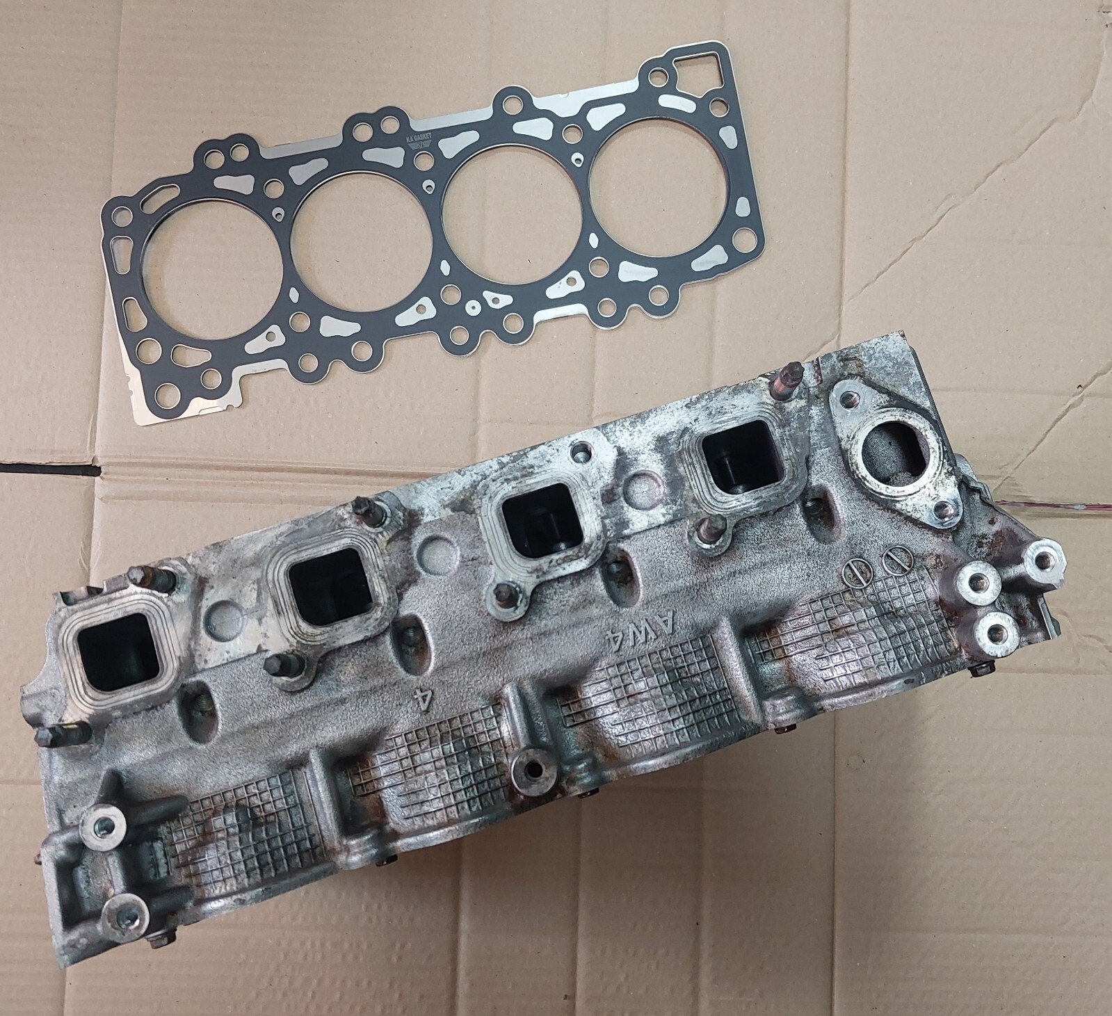 Reconditioned Nissan Navara D40 2.5L YD25 AW4 Cylinder Head & Head